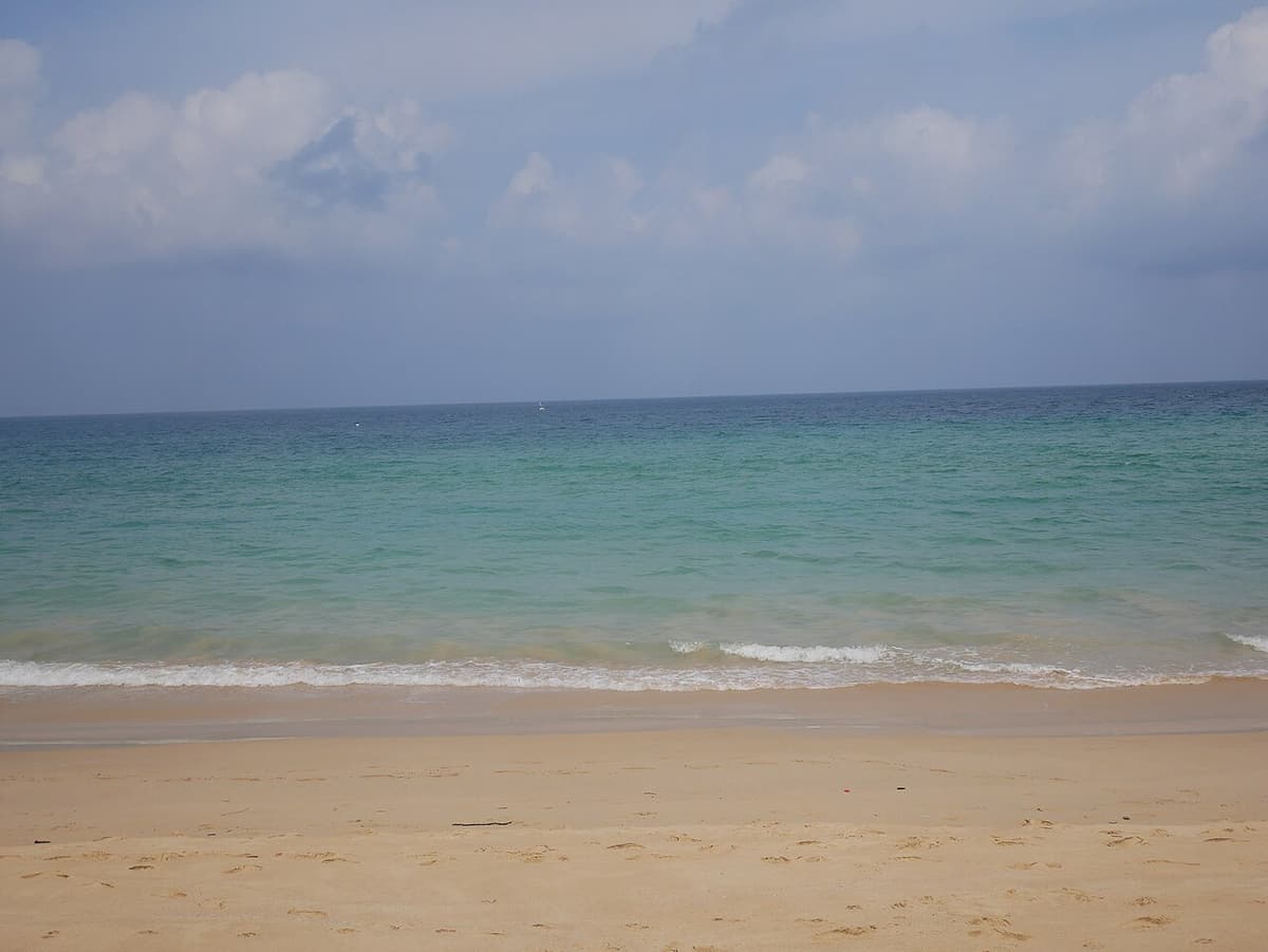 The long open sweep of sand at Karon Beach