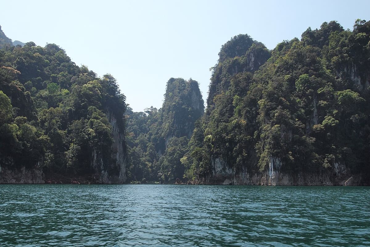 Limestone karst towers above the water of Cheow Lan Lake, Khao Sok