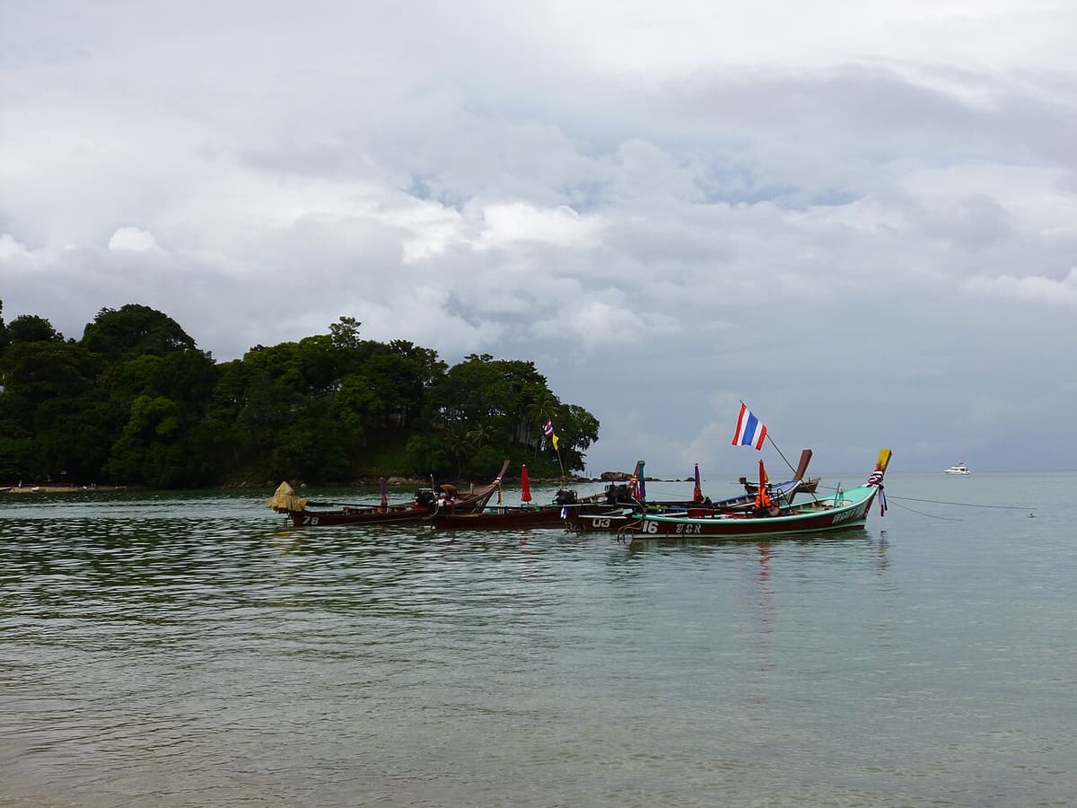 Longtail boats moored off Patong Beach