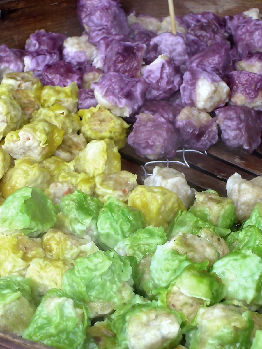 Colourful steamed sweets on a market stall in Phuket
