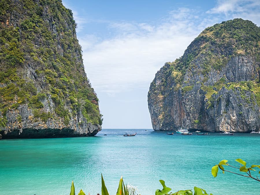 Turquoise water enclosed by the limestone cliffs of Maya Bay on Koh Phi Phi Leh